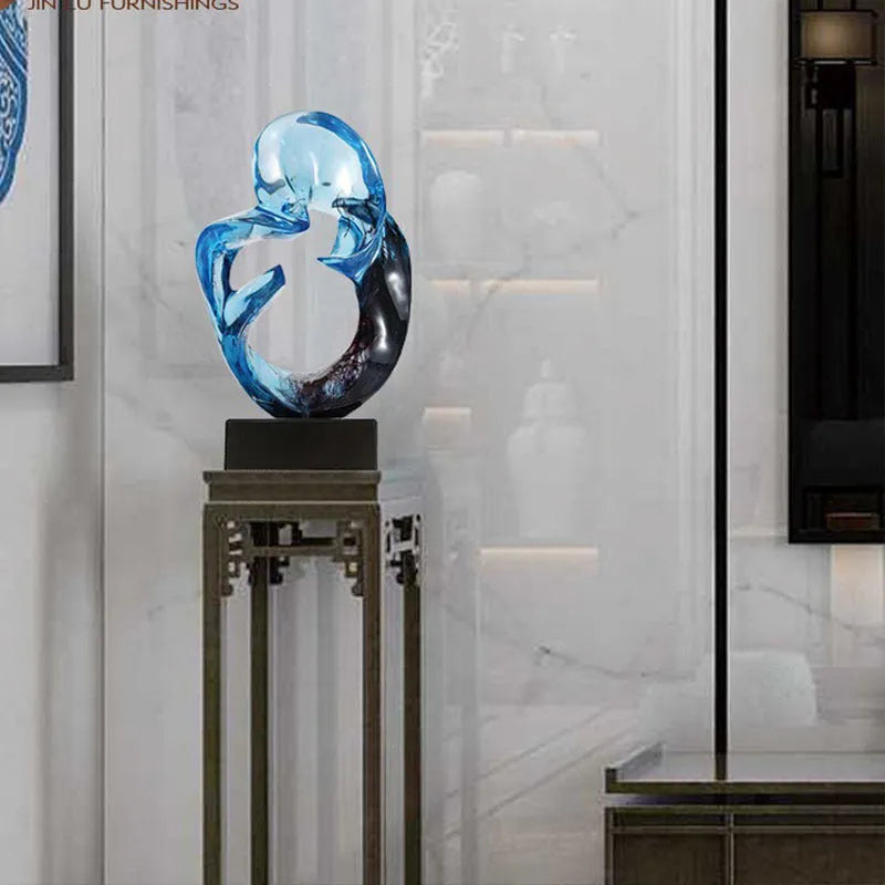 Transparent resin ornament in modern style showing blue or orange red colour option
