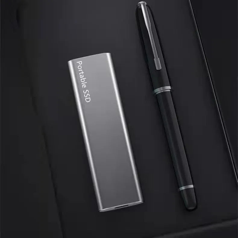 Ultra-thin metal external solid state drive (SSD) in red, black, blue, or silver, showing high-capacity portable storage.