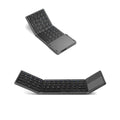 Black tri-fold Bluetooth keyboard shown open next to a smartphone, highlighting its slim 0.8cm profile.