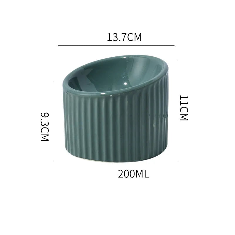 Ceramic elevated cat bowl in green colour with tilted design for anti-vomit feeding