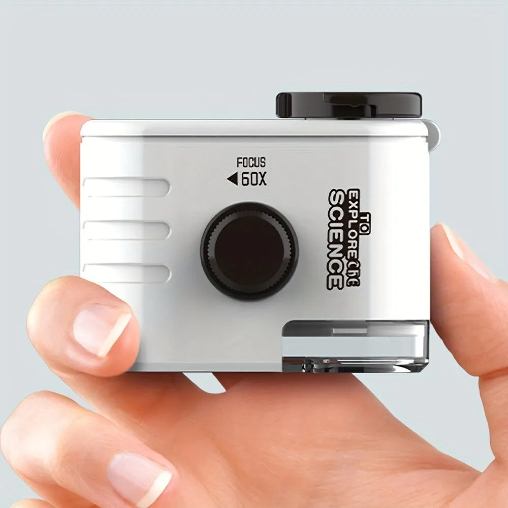Mini 60x magnification smartphone microscope with LED light and detachable clip on a mobile phone