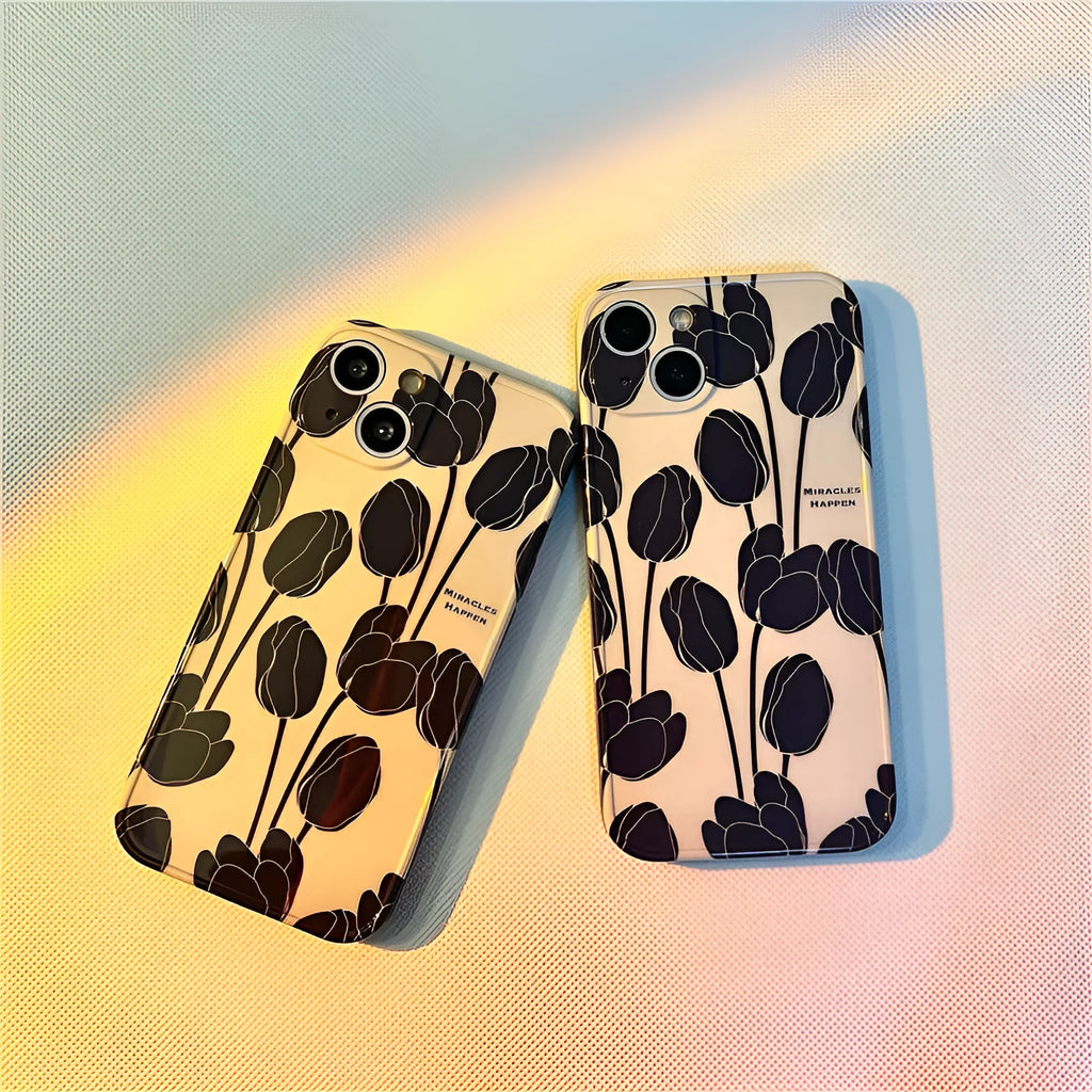 Black silicone iPhone case with a printed tulip floral design on the back.