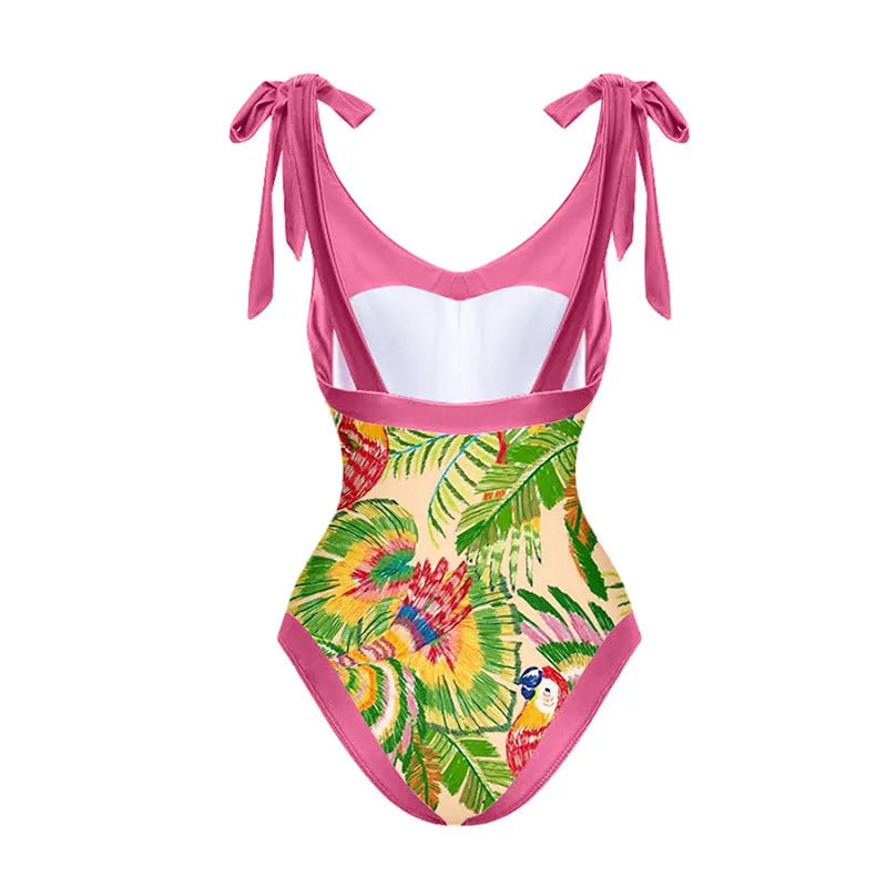 Pink floral print women's V-neck one-piece swimsuit with an attached skirt cover