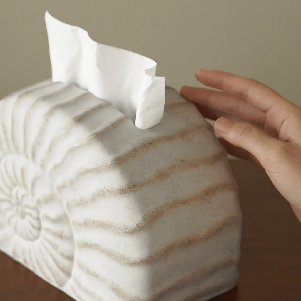 Conch ramble coloured resin decorative tissue box holder with a modern simple design.