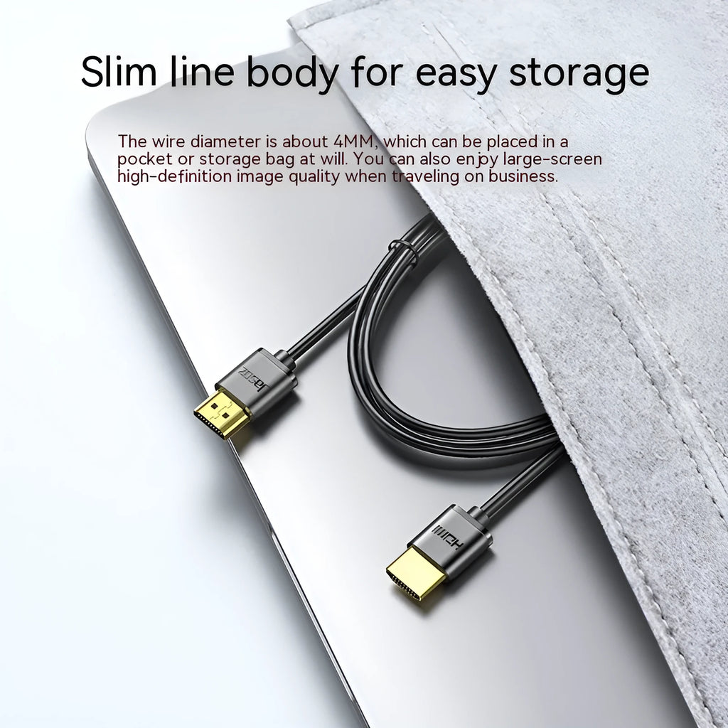Flexible thin HDMI cable with gold-plated connectors and HDMI hairline rule design on a white background.
