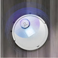 Automatic floor sweeping robot with slim profile on hard floor.