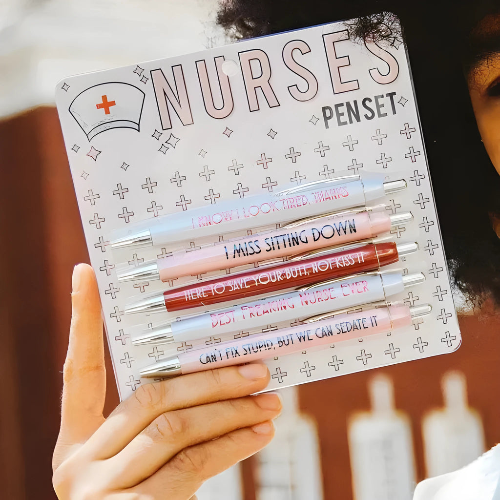 Set of five nurse-themed retractable ballpoint pens with medical designs showing plastic construction