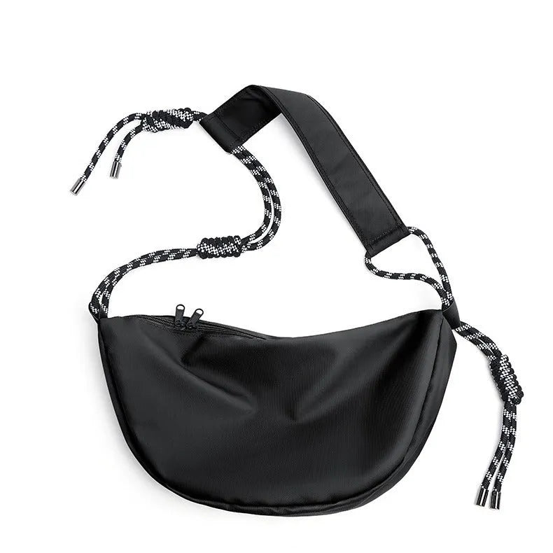 Men's lightweight nylon messenger bag in a choice of colours showing large capacity design.