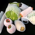 White foam net protective cover for colourful fruit cases available in multiple sizes