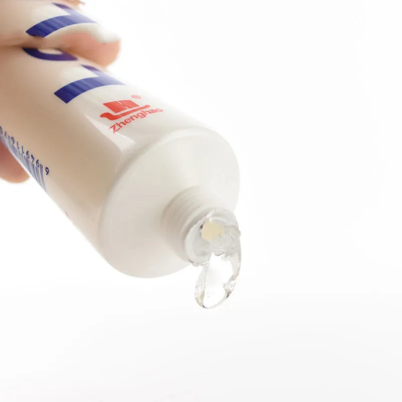White bottle of cherry flavoured water-soluble lubricant 100ml with catheter option