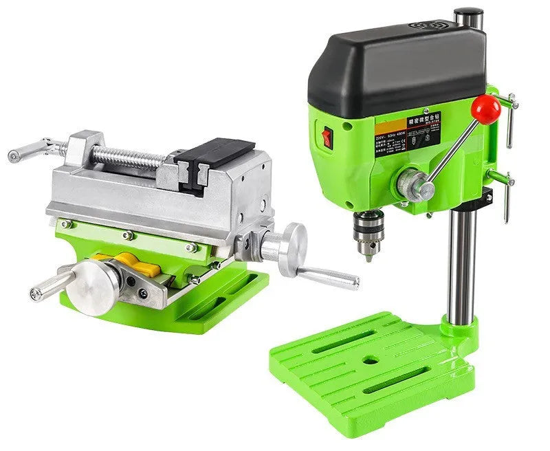 Mini bench drill and milling machine on a workbench with cross bench pliers and heavy-duty pliers.