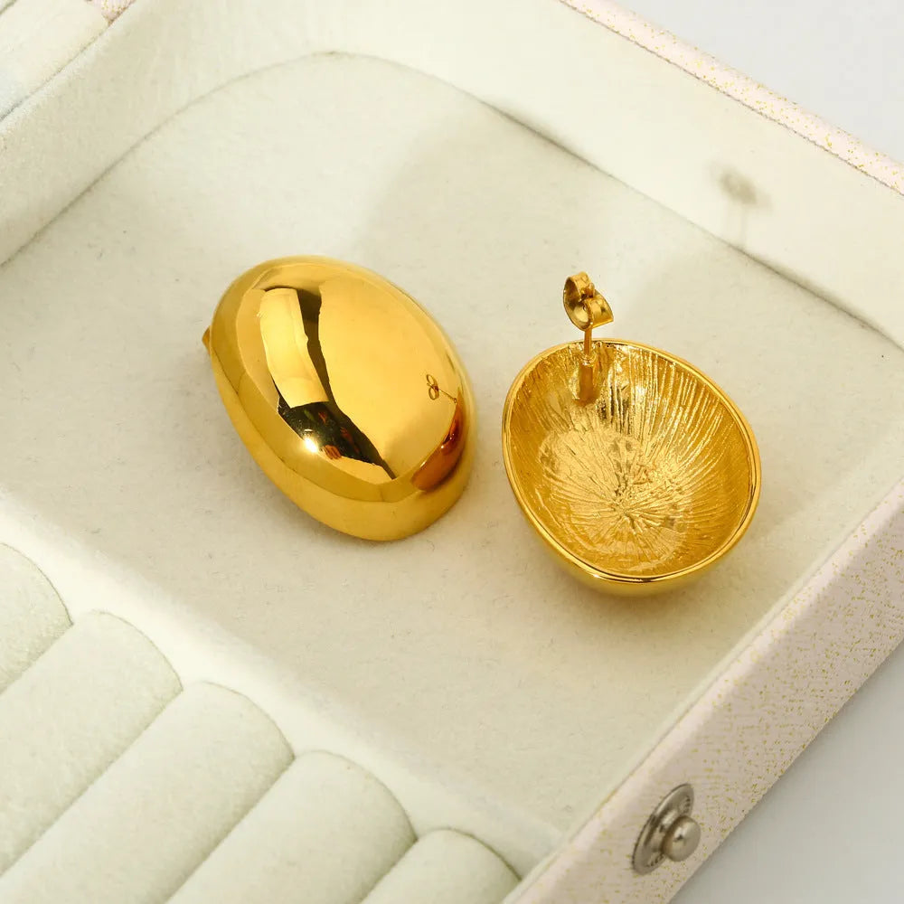 Geometric line ear studs with 18K gold electroplated finish and glazed surface on stainless steel