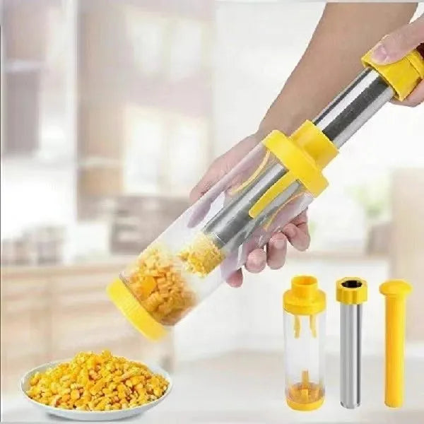 Yellow cylindrical corn stripper tool with stainless steel components on kitchen counter