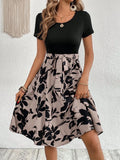 Women's khaki floral print A-line dress with shoulder strap and regular sleeves