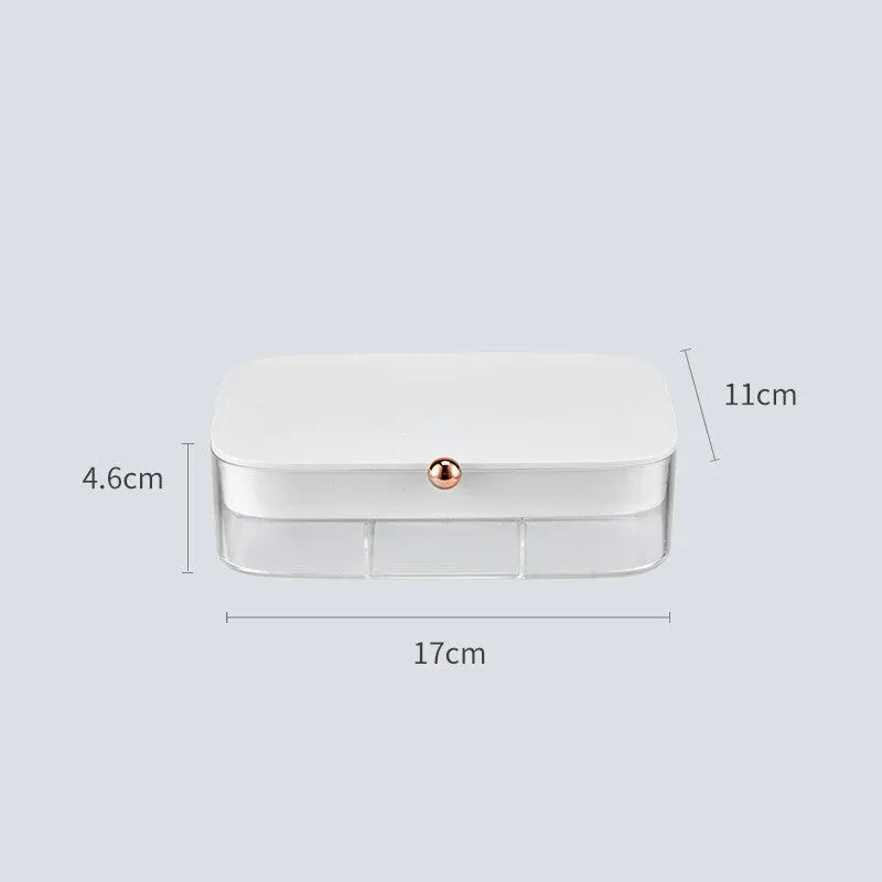 Green minimalist jewellery storage box with multiple internal compartments for rings and earrings.