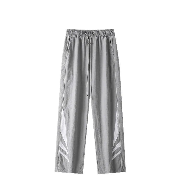 Men's straight leg casual trousers in black with elastic waistband and straight leg opening