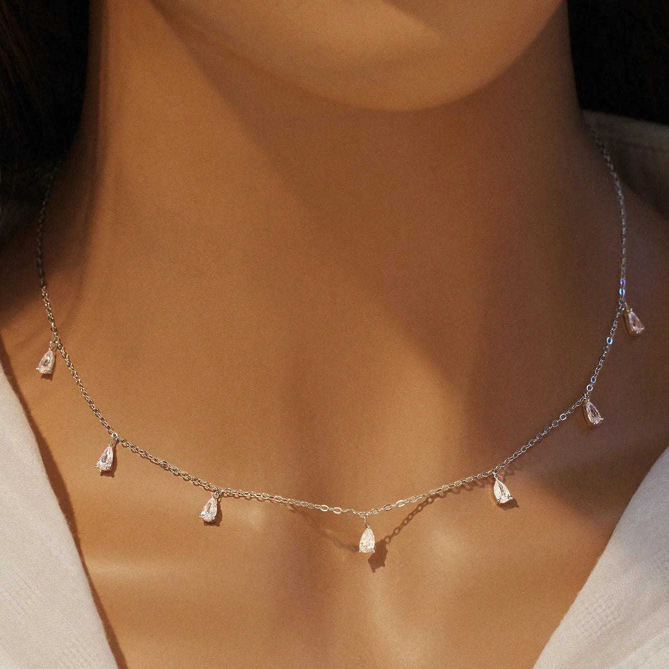 925 silver drop-shaped zircon pendant necklace on an adjustable O-chain in silver, rose gold, or golden yellow.