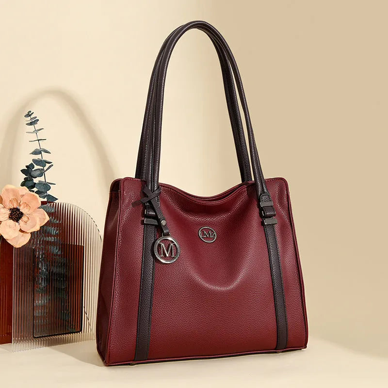 Women's soft black PU leather retro crossbody bag showing double straps and horizontal square shape.