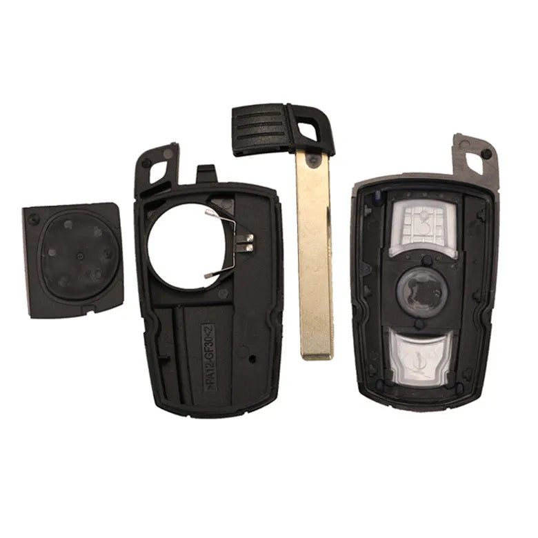 BMW CAS3 semi-intelligent remote car key fob with three blank metal blades attached.