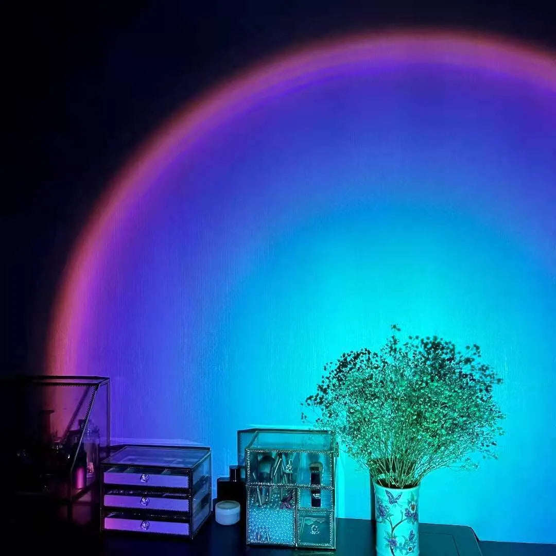 USB rechargeable rainbow sunset projection lamp with push-button control creating colourful atmospheric lighting