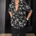 Short sleeve floral print shirt in black or white with loose casual fit