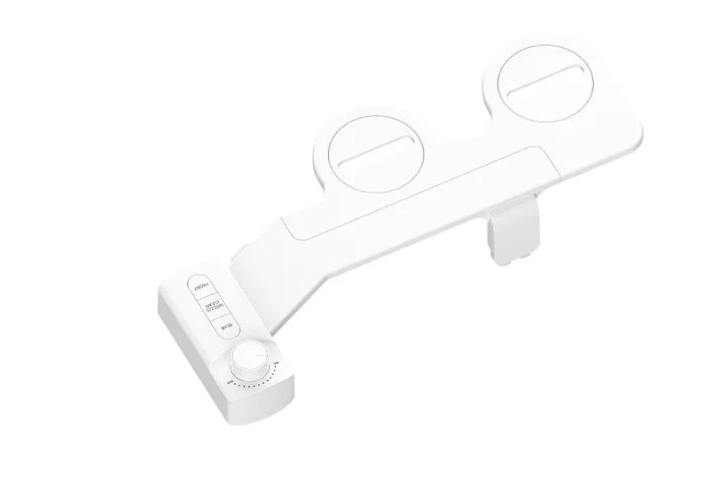 Pure white bidet attachment with button control and detachable nozzle on modern toilet