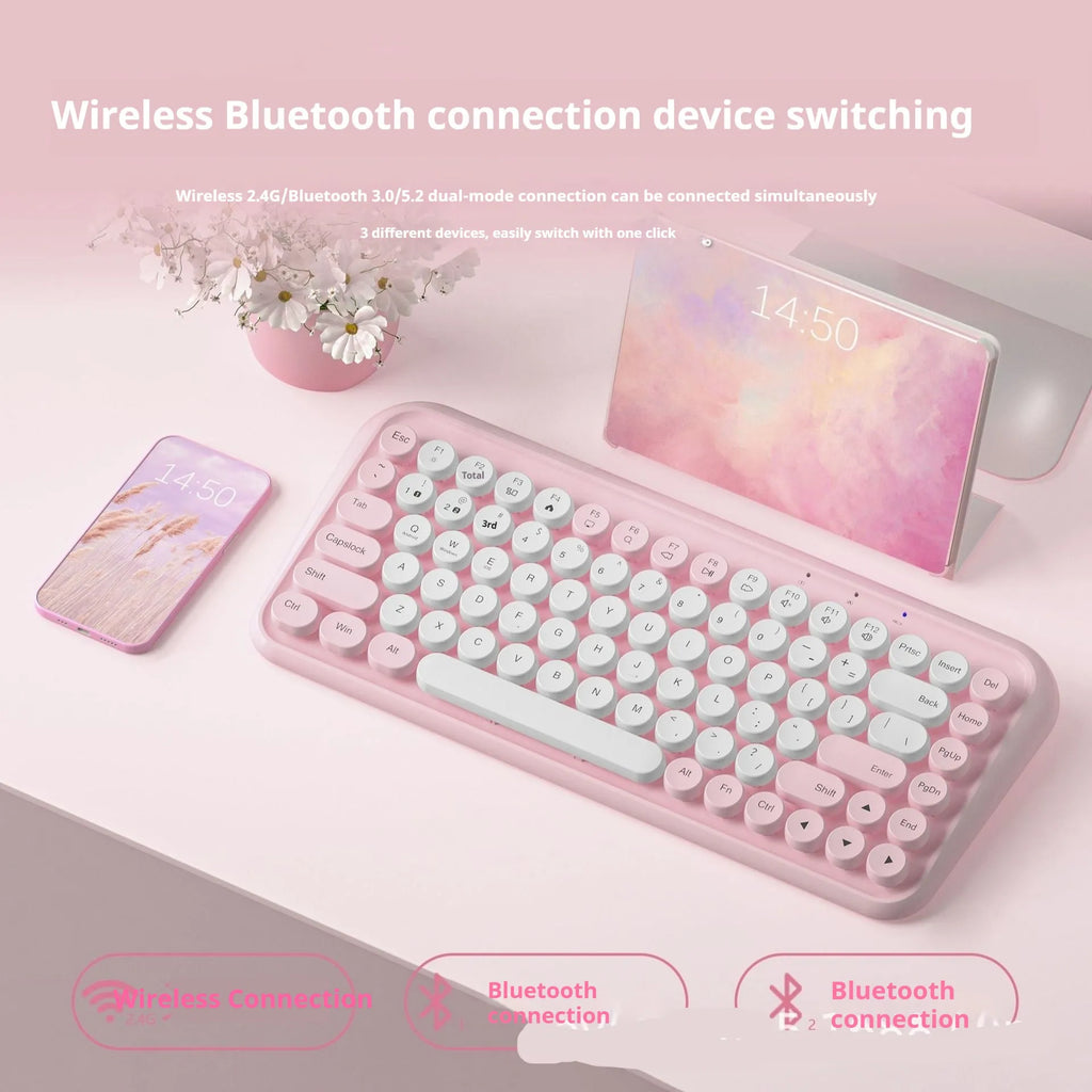 Pink portable Bluetooth keyboard with 84 keys and wireless connectivity