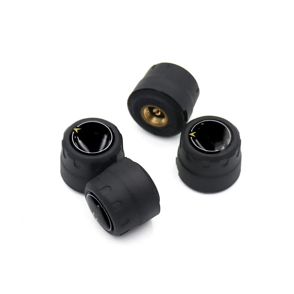 Bluetooth 5.0 automotive tire pressure monitoring system with four black external sensors, a wrench, and anti-theft screws.