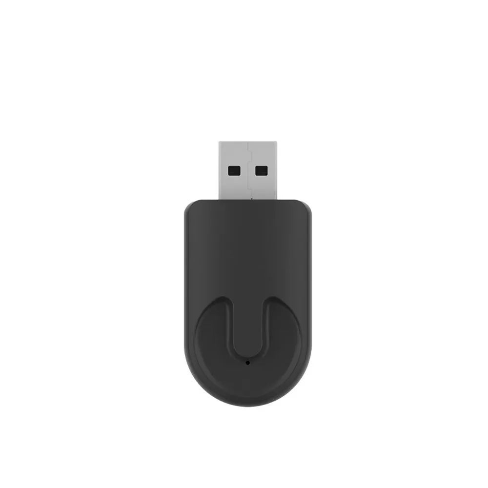 Black USB wireless CarPlay adapter with compact dimensions for vehicle dashboard installation