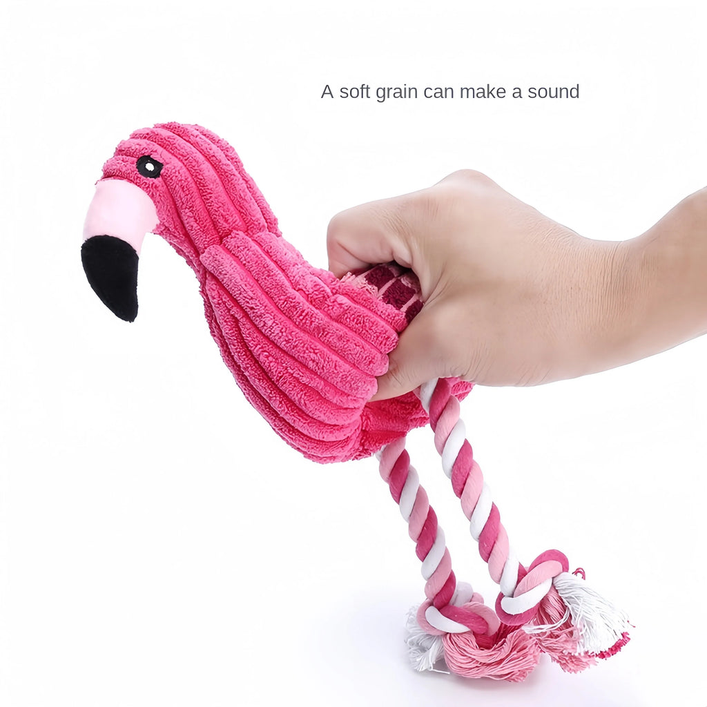 Pink animal-shaped corduroy plush dog toy with a squeaker.