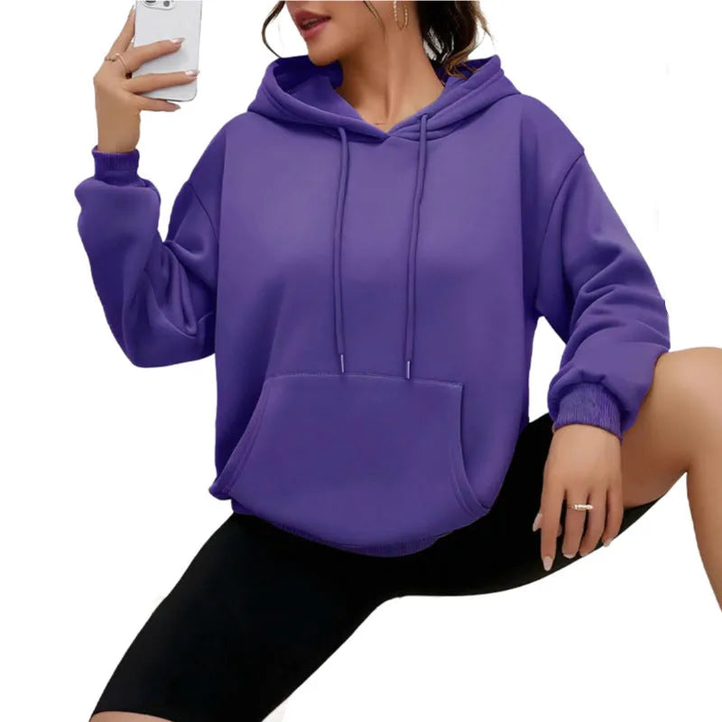 Women's loose drawstring pocket sweatshirt in various colours showing front pockets and adjustable collar
