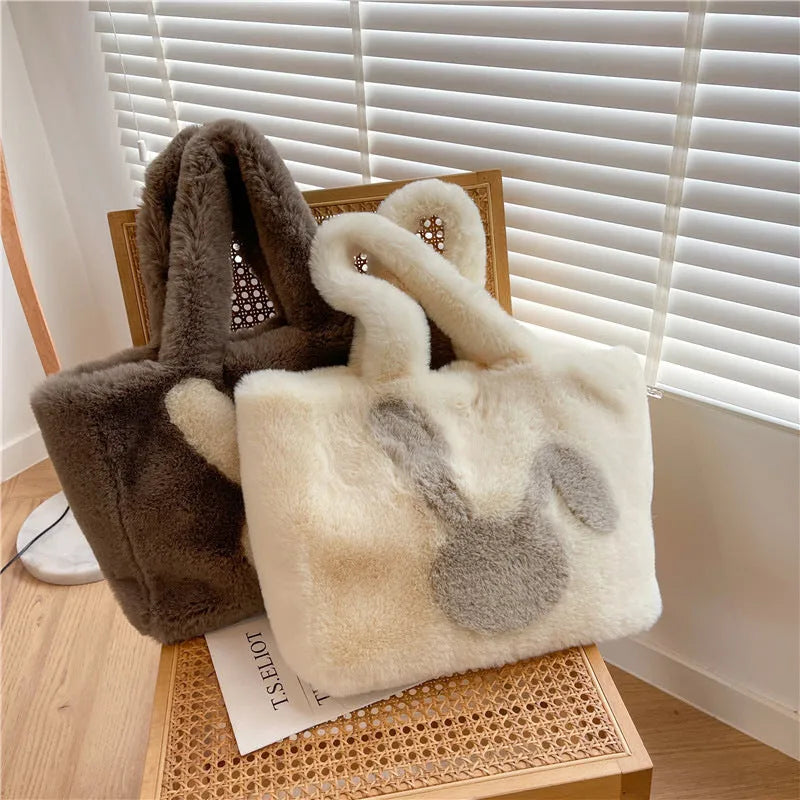 Cute cartoon rabbit ears plush shoulder tote bag in a solid colour.