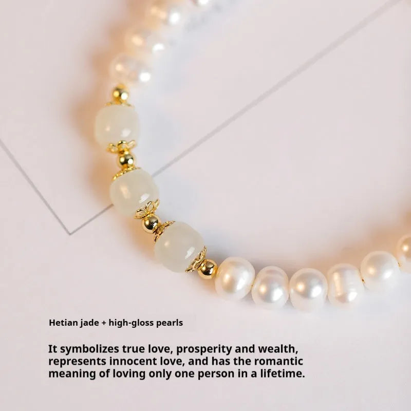 Natural freshwater pearl bracelet with diamond-shaped beads in Hetian jade colour on wrist