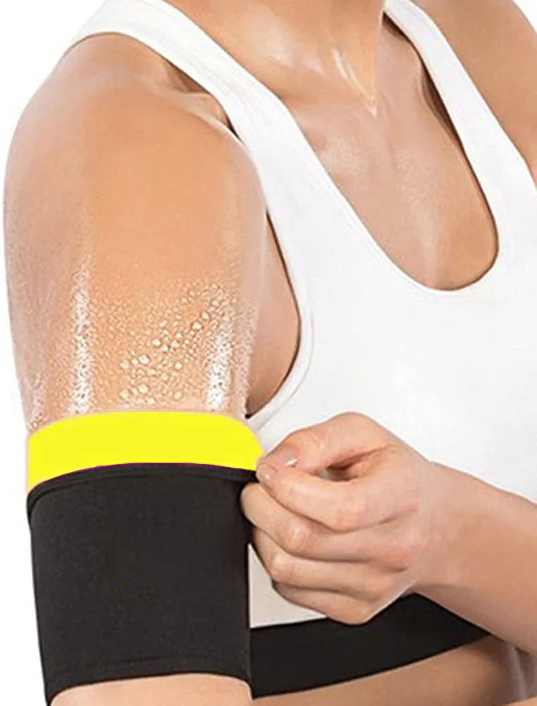 Blue compression arm band with a separate black wrist support strap laid flat.
