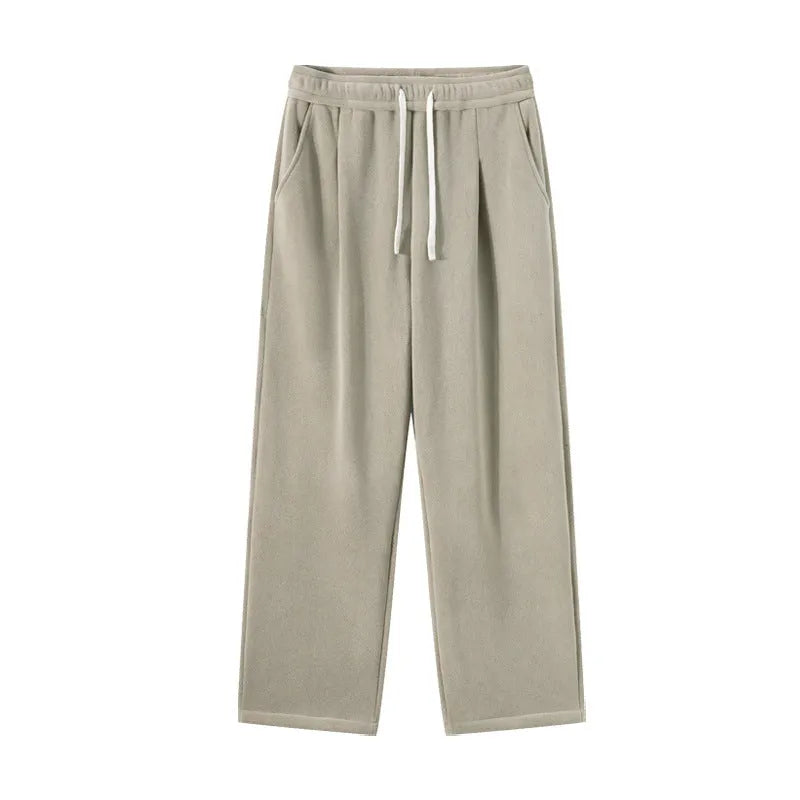 Men's apricot double-sided polar fleece trousers with a wool lining, shown with a drawstring waist.