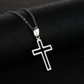 Stainless steel cross necklace on display showing O-shaped chain and pendant in steel colour finish