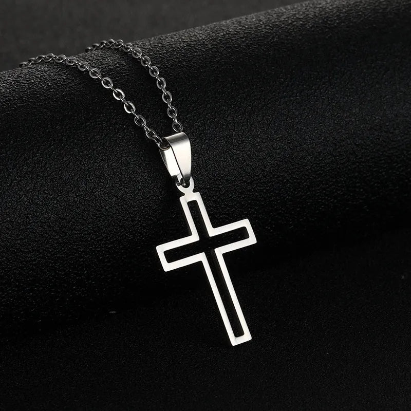 Stainless steel cross necklace on display showing O-shaped chain and pendant in steel colour finish