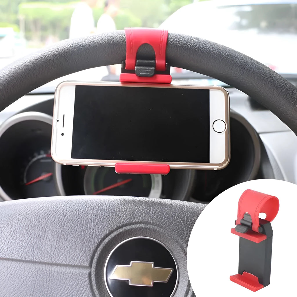 Black universal steering wheel phone holder clip mounted on a car steering wheel with a smartphone secured.