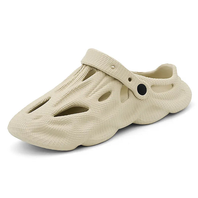 EVA soft men's summer beach shoes in grey colour on sandy surface