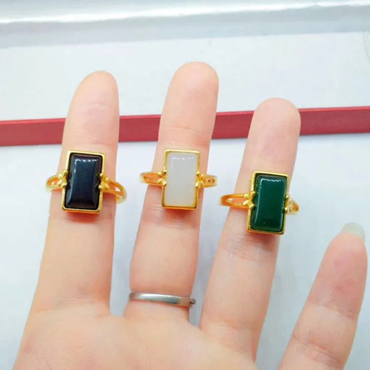 Adjustable brass gold-plated ring with black gemstone inlay and electroplated finish
