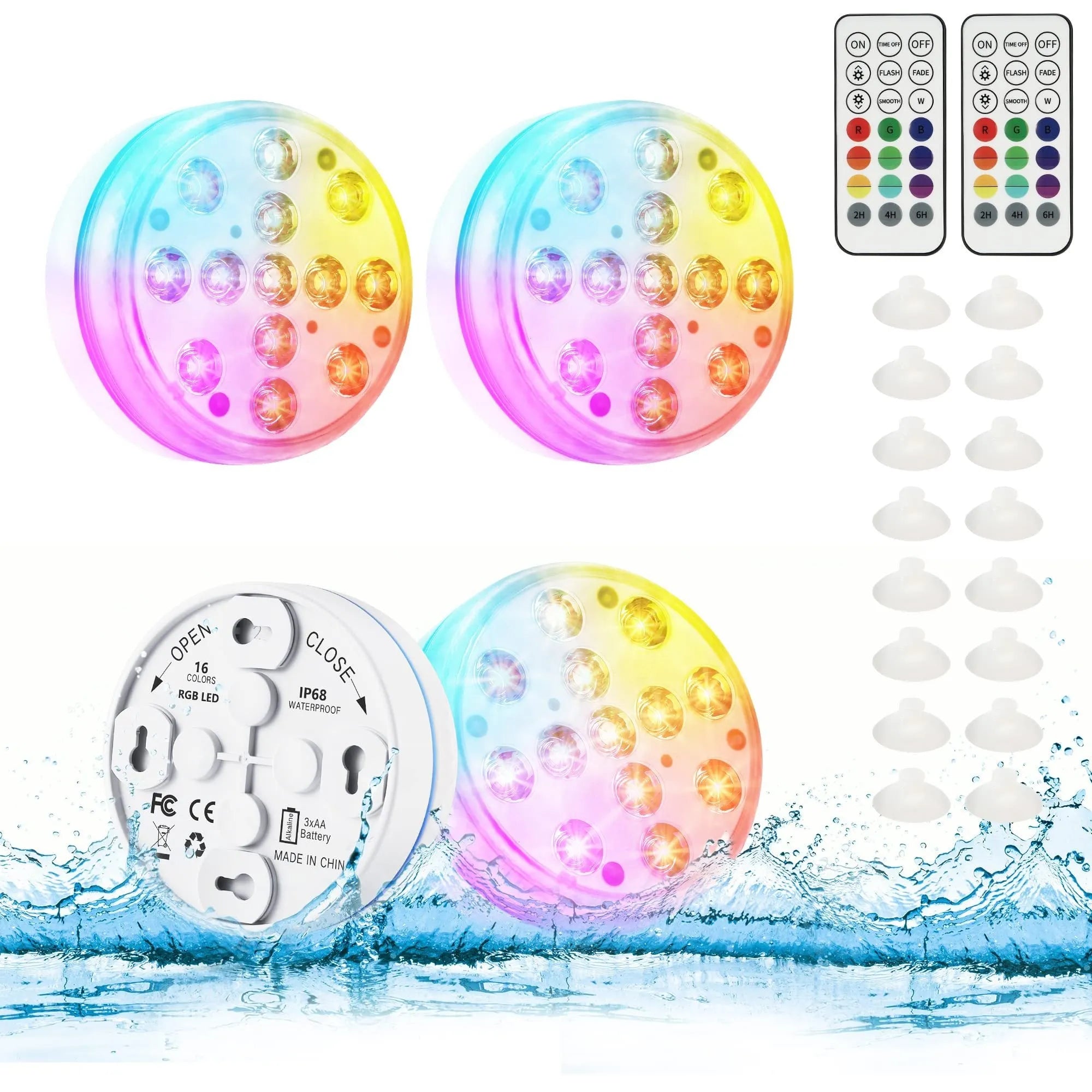 Remote control and a small cylindrical IP68 waterproof diving light with colour changing LEDs for aquariums.