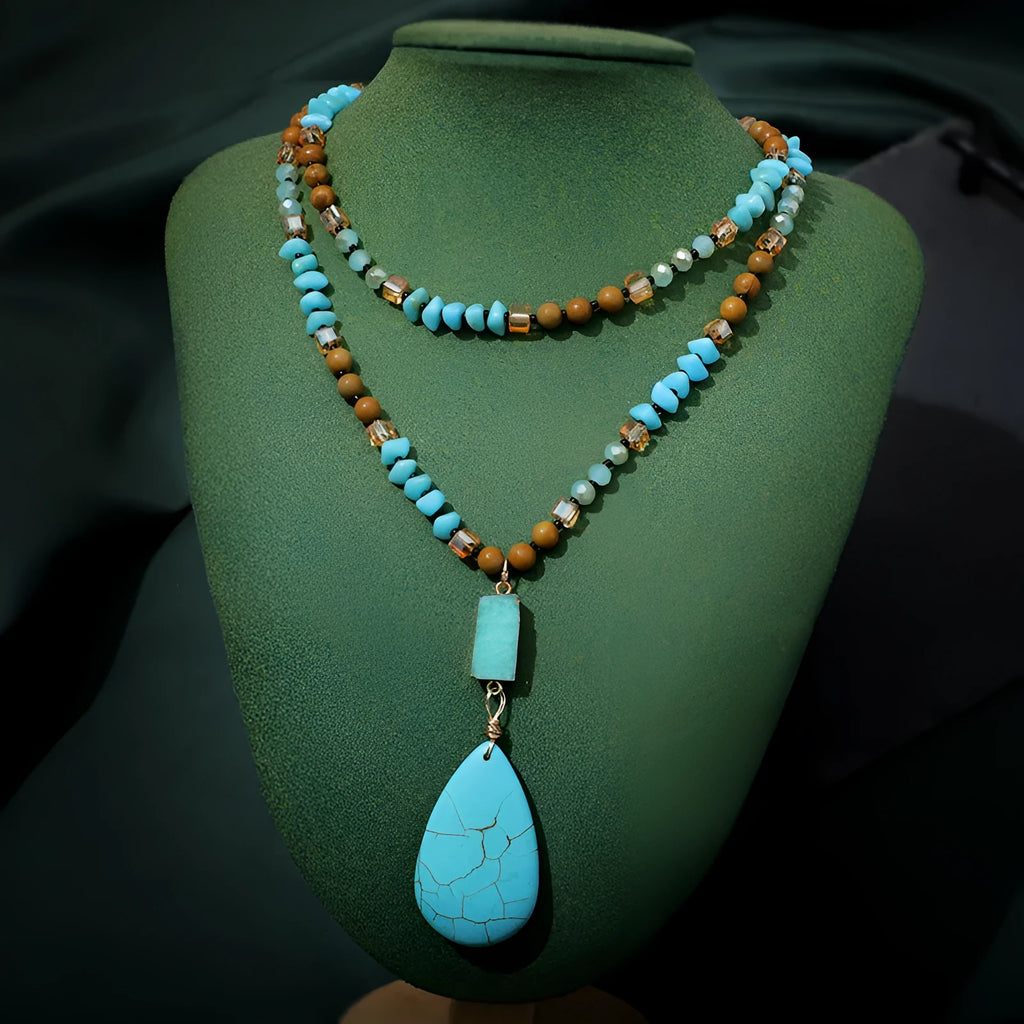 Blue turquoise pendant necklace with mixed gem inlay drop design on ball bead chain