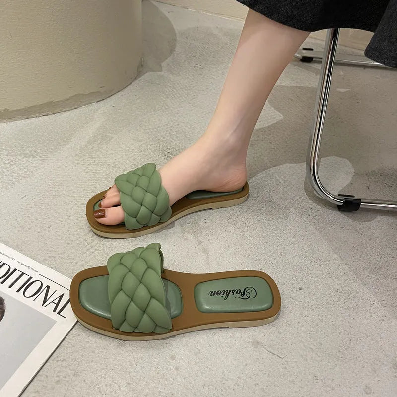 Women's plaid PVC beach sandals with thick anti-skid soles in black, green, orange and white.