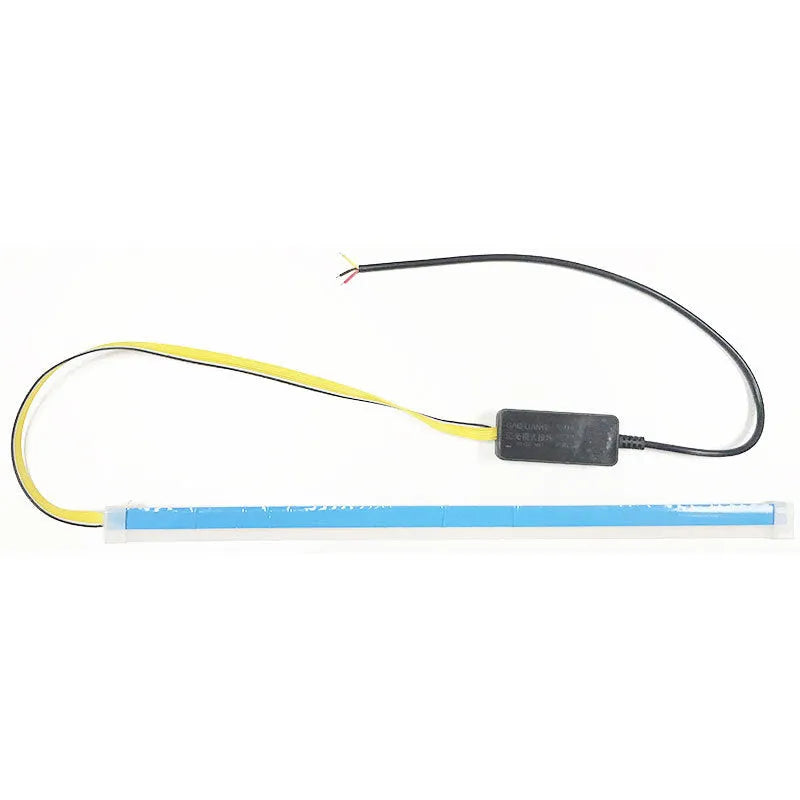Flexible silicone car LED daytime running light strip with flowing turn signal functionality mounted on vehicle headlight