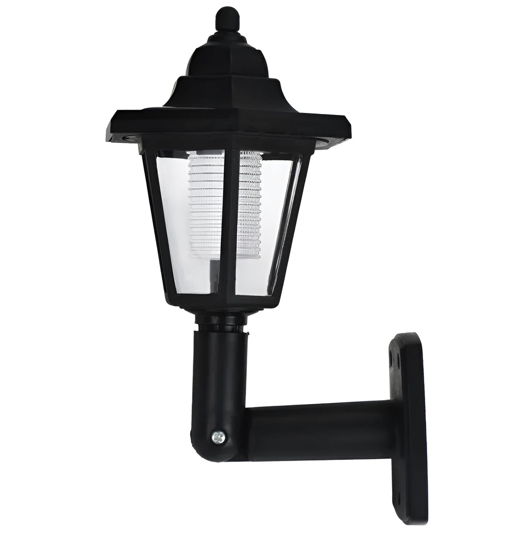 Black hexagonal solar-powered outdoor wall light with a visible solar panel and LED.