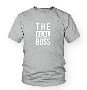 Man wearing a loose fit round neck short sleeve T-shirt with a graphic print design.