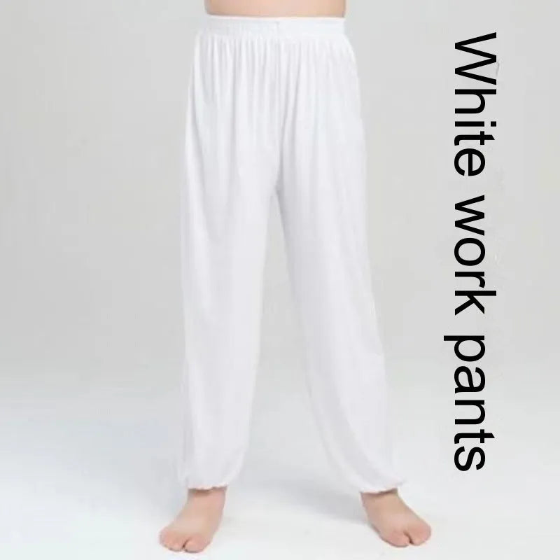 Child wearing black high elasticity Sanda practice pants made from spandex Lycra for martial arts training.