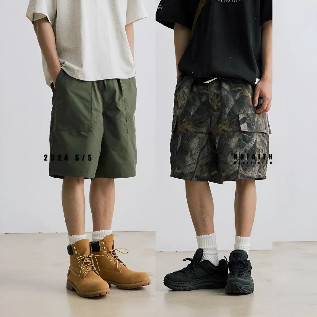 Men's loose fit straight-leg denim shorts in army green colour with a mid waist and zip fly.
