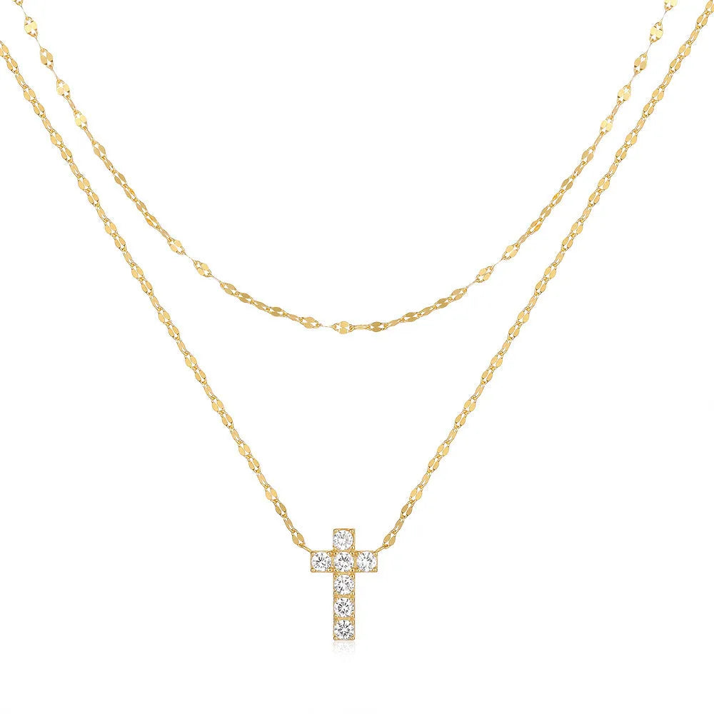 S925 sterling silver double layer cross pendant necklace with twin diamond details on a clavicle chain.