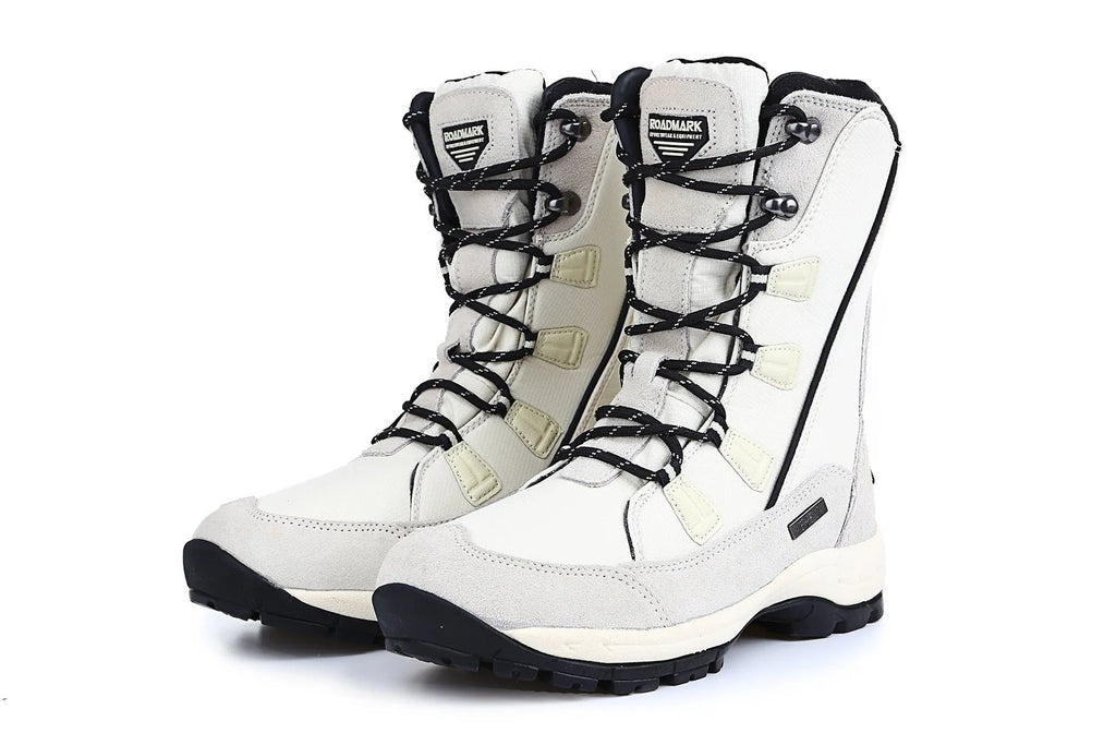 Women's mid-calf length black genuine leather thermal snow boots with a round toe and rubber sole